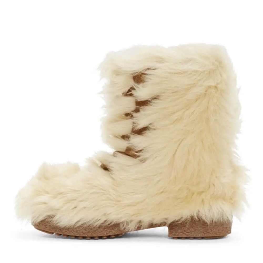 Yves Saint Laurent Beige fur boots.
